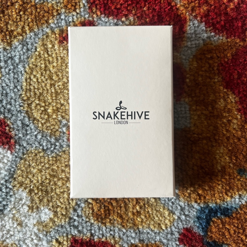 NIB Snakehive IPhone 8 Wallet case.  Beautiful green color.